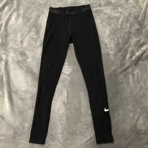 Black Nike dri-fit leggings with waistband detail